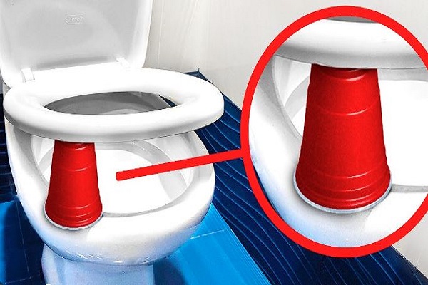 Why Put a Red Cup under Toilet Seat at Hotel?